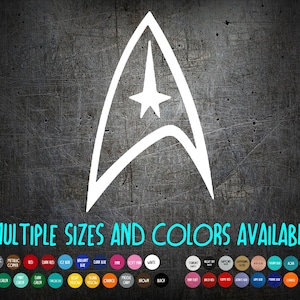 May include: White Starfleet insignia graphic on a dark, textured background. The image includes the text "MULTIPLE SIZES AND COLORS AVAILABLE" and a color palette. This design is likely a decal or sticker.