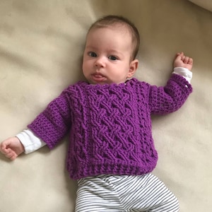 Crown of Cables Braided Baby Sweater Crochet Pattern for Boys and Girls (size 0 to 12 months)