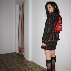 Red and black Reebok mini backpack or shoulder bag
