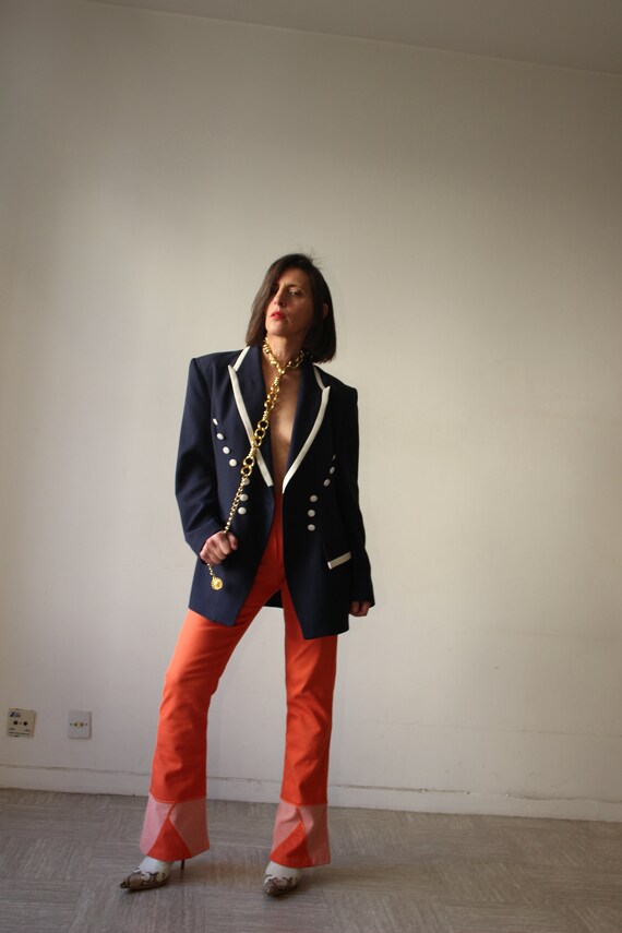 High-waisted trousers with stretch orange bell bo… - image 9