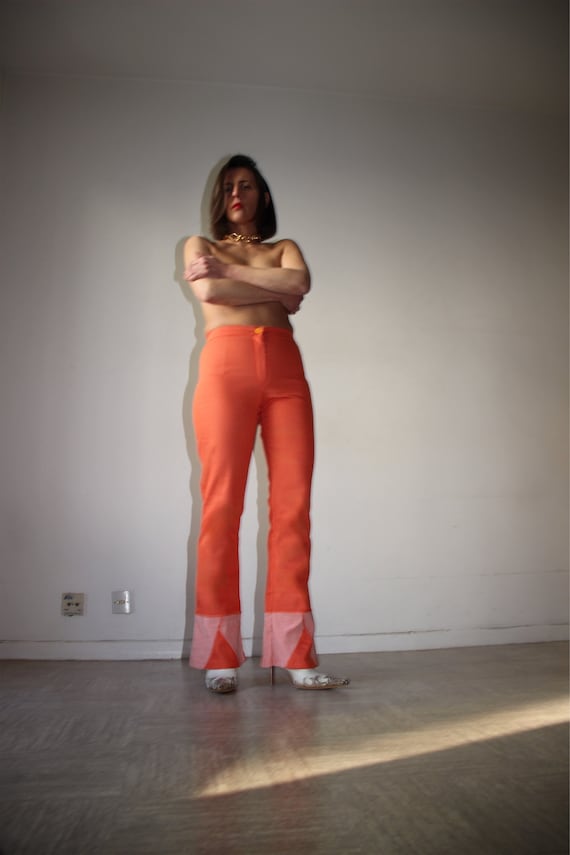 High-waisted trousers with stretch orange bell bo… - image 1