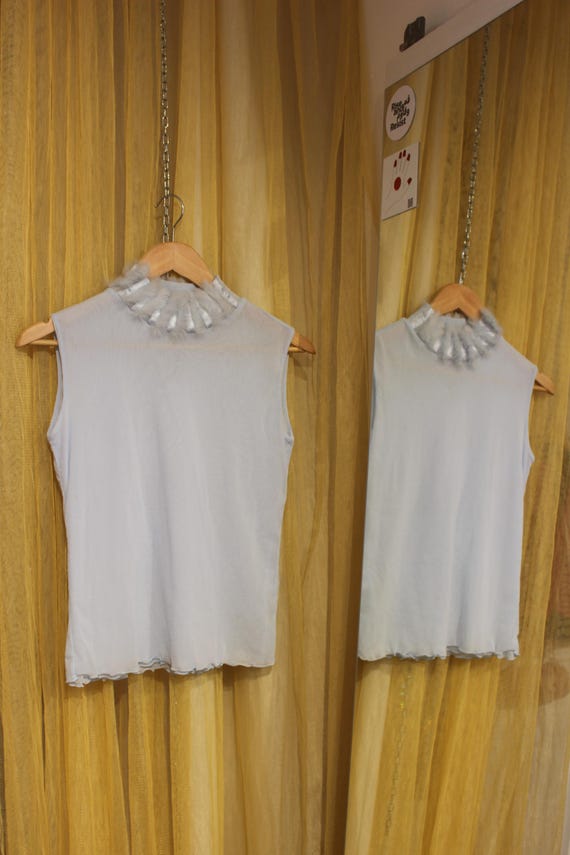 Maglione senza maniche, collo alto boa di piume in doppia maglia