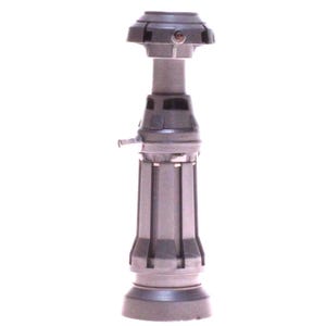 May include: A gray and black industrial-style object with a cylindrical base and a flared top. The object has a series of vertical grooves and a small, protruding nozzle. The top section has a circular design.