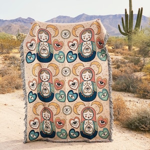 Nesting Matryoshka Doll Woven Throw Blanket, nesting doll woven fringe blanket, witchy doll Throw, mystical evil eye Large Throw Blanket