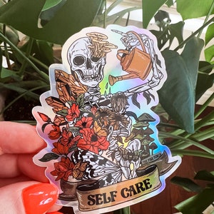 Self Care Skeleton Holographic Sticker, self care floral moth skeleton watering can sticker, self care sticker, wilting skeleton sticker