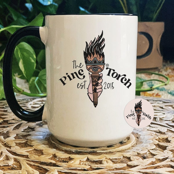 The pine torch mug, torch evil eye mug, sacred torch mug, the pine torch logo mug, pine torch mug, liberty torch mug
