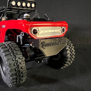 SCX24 Deadbolt LF Front Bumper Skid Plate