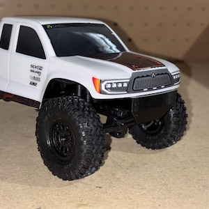 SCX24 Deadbolt LF Front Bumper Skid Plate