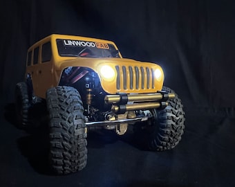 Reubicación de los faros y parachoques de la barra de empuje extrema del Jeep Wrangler/Gladiator SCX24