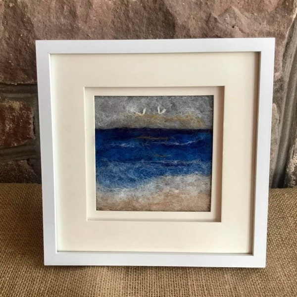 Seascape needle felted framed picture. Needlefelted using British wools onto a natural panel.