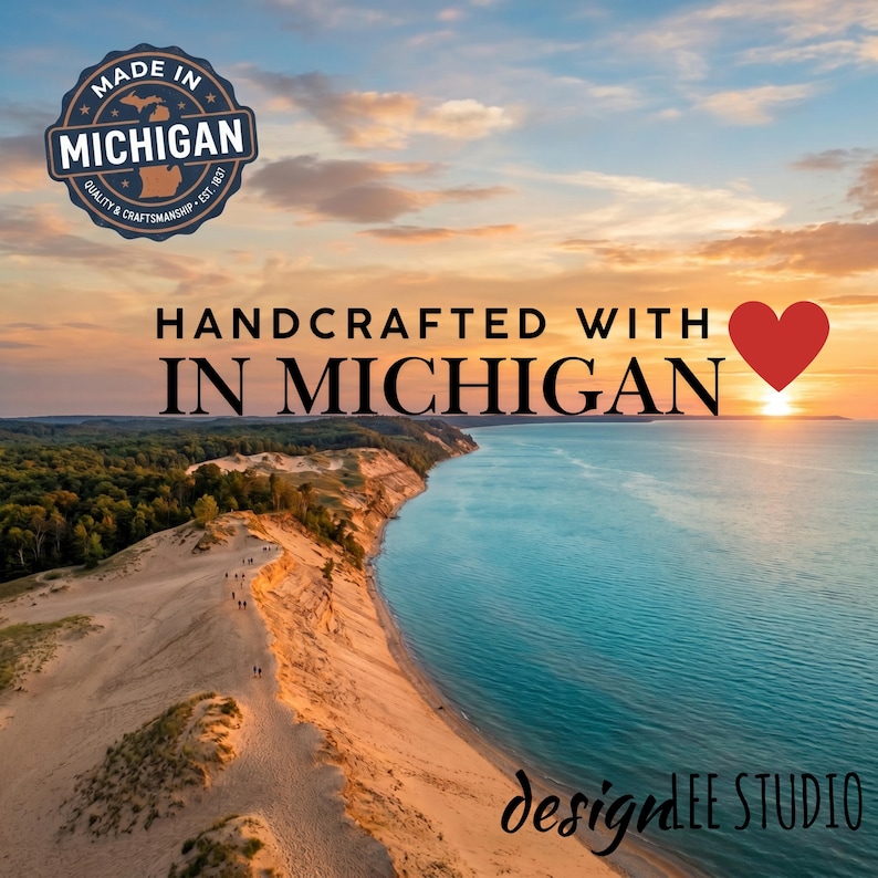 May include: Scenic image featuring a Michigan landscape with a sandy dune, blue water, and a sunset. Text includes "Handcrafted with in Michigan" and a "Made in Michigan" seal.