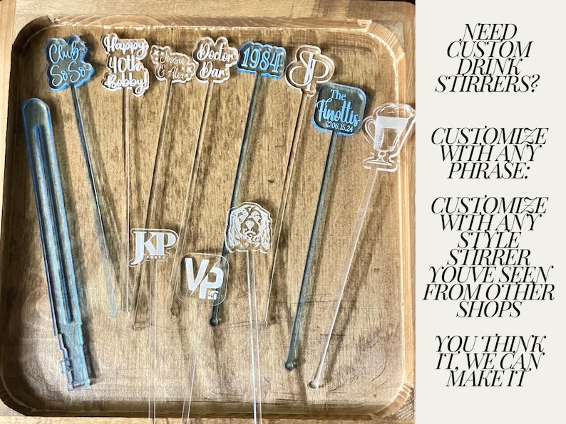 May include: A variety of custom acrylic drink stirrers with different designs and text. The stirrers are displayed on a wooden surface.  NEED CUSTOM DRINK STIRRERS? CUSTOMIZE WITH ANY PHRASE: CUSTOMIZE WITH ANY STYLE STIRRER YOU'VE SEEN FROM OTHER SHOPS YOU THINK IT. WE CAN MAKE IT