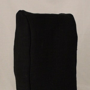 May include: A black fabric storage box with a rectangular shape.