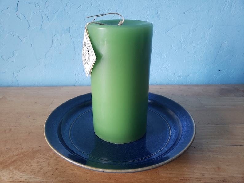 3 round, scented pillar candles 3 in x 6 in Handcrafted by a 3rd generation family owned business long burning and lightly scented Green/Bayberry