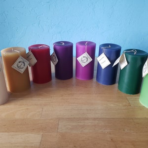 3 round, scented pillar candles 3 in x 6 in Handcrafted by a 3rd generation family owned business long burning and lightly scented Multiple Colors