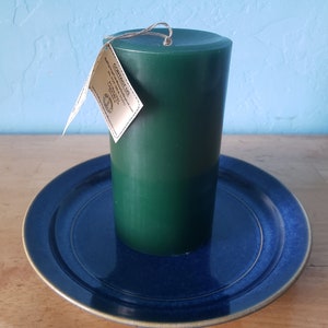 3 round, scented pillar candles 3 in x 6 in Handcrafted by a 3rd generation family owned business long burning and lightly scented ForestGreen/Wisteria