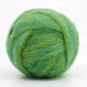 May include: A ball of green and blue wool yarn. The yarn is soft and fluffy, and it is perfect for knitting or crocheting.