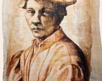 May include: A sepia-toned portrait painting on a textured papyrus sheet depicting a person wearing a flat cap and a collared garment. The artwork features visible brushstrokes in shades of brown and cream, with the signature F. Lemon in the corner.