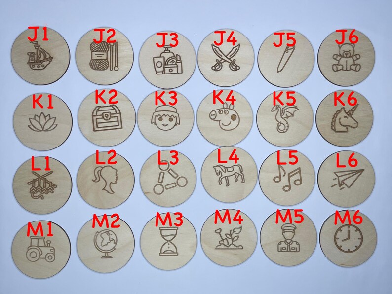 May include: Twenty-four wooden circles with different images and letters on them. The letters are J1, J2, J3, J4, J5, J6, K1, K2, K3, K4, K5, K6, L1, L2, L3, L4, L5, L6, M1, M2, M3, M4, M5, and M6.