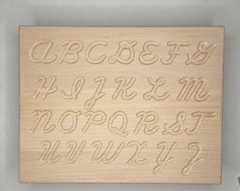 Montessori alphabet tracing board made of wood - hand writing