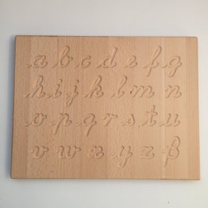 Montessori träalfabetstavla i latinsk skrift