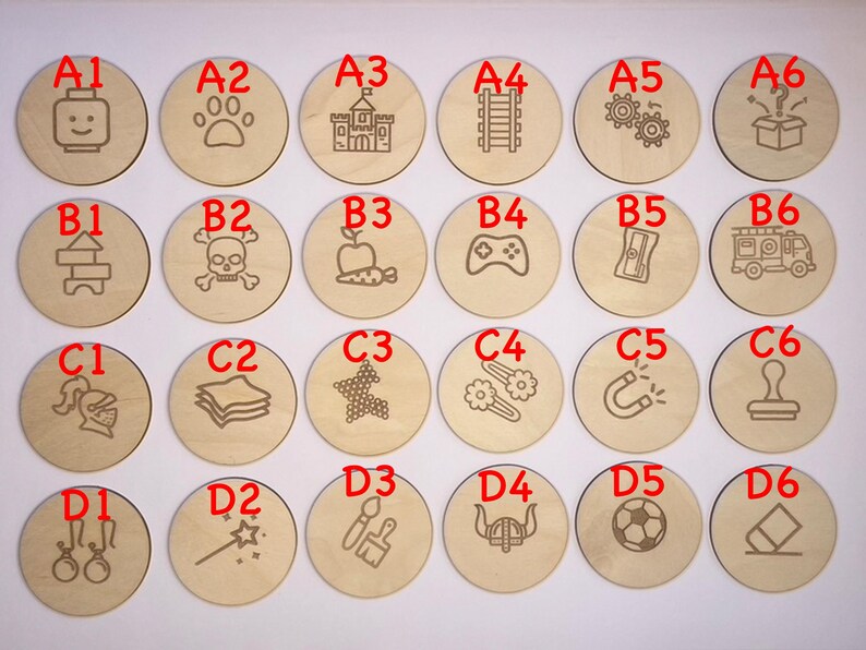 May include: Twenty-four wooden circles with different designs and letters A1 through D6. The circles are arranged in four rows of six circles each.