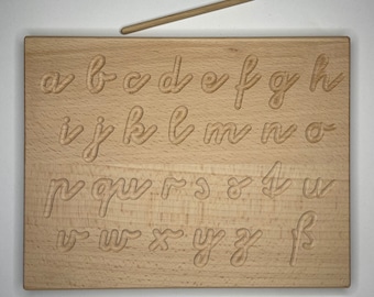 learn handwriting on Montessori alphabet board made of wood in upper and/or lower case letters