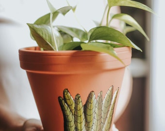 Terra cotta handpainted flower pot green plant design