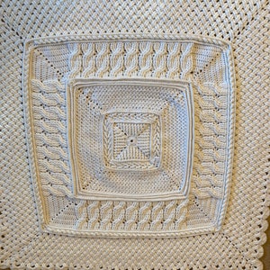 A unique, hand-crocheted Celtic Mandala-Style Afghan ready to keep you warm!