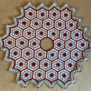 Elegant, hand-crocheted Christmas Tree Skirt