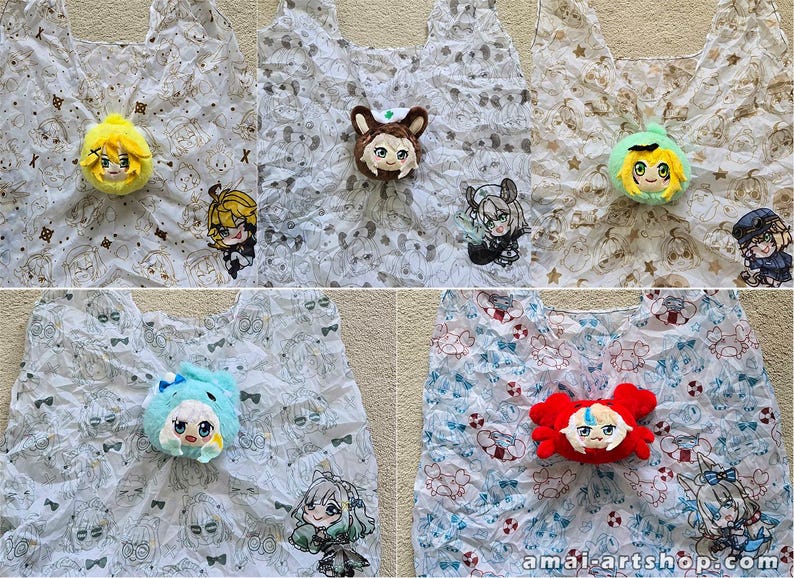 May include: Five reusable shopping bags featuring various anime-style character prints and matching plush character heads attached to the center. The bags have white backgrounds with repeating patterns of small icons and characters, with the text amai-artshop.com.
