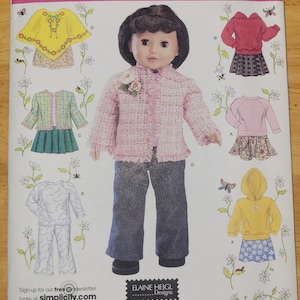 May include: Simplicity pattern 4297 for 18 inch doll clothing. The pattern includes a pink jacket with a ruffled trim, a green skirt, a yellow hooded sweatshirt, a pink sweater, a plaid skirt, a yellow cape, a blue and white pajama set, and a red sweater with a plaid skirt. The pattern is for one size.