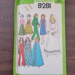 May include: Simplicity sewing pattern number 8281 for making doll clothes. The pattern includes six different outfits, including a wedding dress, a cape, and a jumpsuit. The pattern is for one size and costs $1.75.
