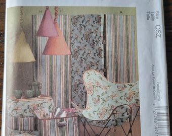 May include: A McCall's Home Decorating pattern for a butterfly chair, two storage boxes, and three lampshades. The pattern number is M5074 and the size is OSZ.