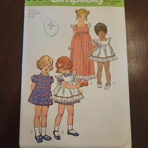 May include: Vintage Simplicity sewing pattern, size 3, with illustrations of children's dresses. The cover shows the number 5534 and the price 85c. The dresses are in different styles, including a red gingham dress and a blue floral dress.