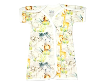May include: A white baby wrap with a jungle animal print. The wrap features giraffes, lions, elephants, and zebras in watercolor-style illustrations. The wrap has a white trim and a white wrap closure.