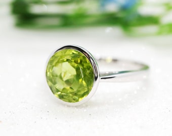Green peridot gemstone ring in white gold setting - Green gemstone for August birthstone ring with simple band and bezel setting