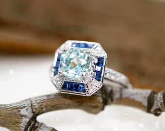Art deco sapphire and aquamarine ring in white gold with diamonds in a square setting, aquamarine, tones of blue gemstone combination ring