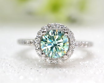Minty green moissanite diamond ring in a classic halo design set in white gold, Moissanite engagement ring, Green moissanite ring