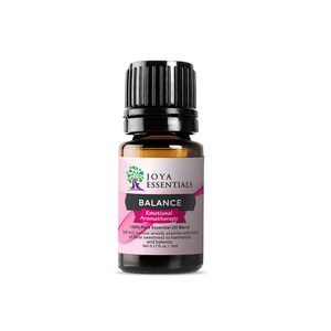 May include: A small brown glass bottle with a black cap, labeled "JOYA ESSENTIALS BALANCE Emotional Aromatherapy 100% Pure Essential Oil Blend Soft and mellow woody essence with hints of floral sweetness to harmonize and balance. Net 0.17 fl oz./5ml"