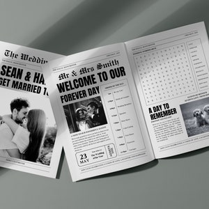 May include: A black and white wedding newspaper with the headline "The Wedding". The newspaper features photos of the couple, a word search, and the text "Welcome to Our Forever Day".