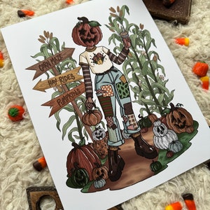 May include: A digital illustration of a person with a pumpkin head wearing a striped shirt, patched jeans, and boots. The person is holding a cup of coffee and standing in a cornfield. There are signs that say "Corn Maze", "Hay Rides", and "Pumpkins". There are also pumpkins scattered around the person.