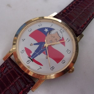 Novelty Bill Clinton Quartz Watch, Runs Backwards.
