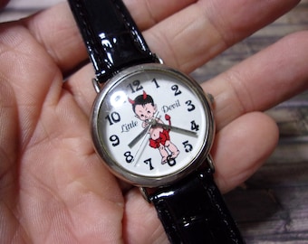 Vintage N.O.S. Lil Devil Dingbats wristwatch in orig. container on a new band- So Cute!!