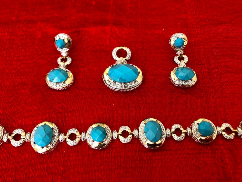 Gold plated sterling silver bracelet earrings and pendant set