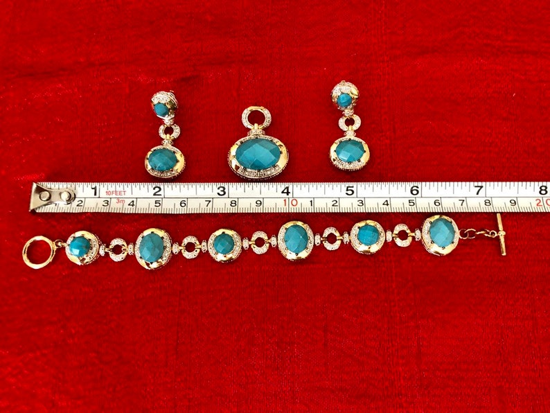 Gold plated sterling silver bracelet earrings and pendant set