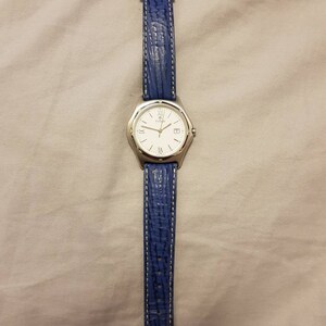 Rare Titan tilbllsw5 silver stainless steel case w/blue leather band watch
