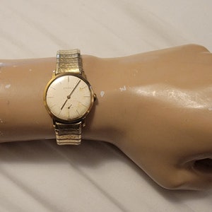 Juvenia watch - Etsy 日本