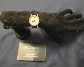 Vintage Movado 87-A1-832 Gold Plated Swiss-made Whit Dial  display picture 1