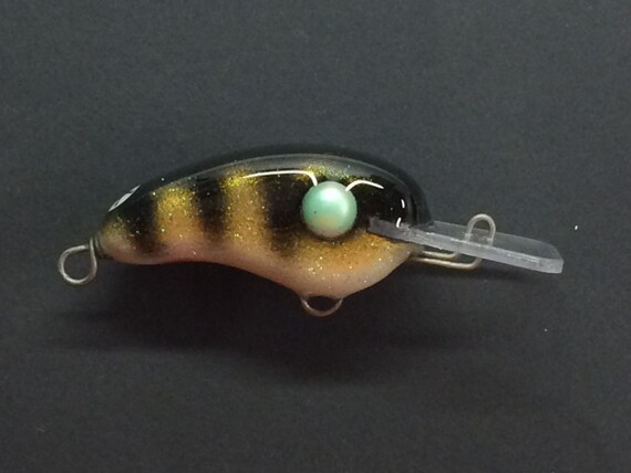 cherry bomb fishing lure Morris Lures - 12" Blue Tint- Like New! Morris Lures Saltwater Tackle The 13 Fishing Paralyzer is a panfish soft plastic bait for fishing in the open water and for hard water ice fishing Cherry Bomb - Black Bettty